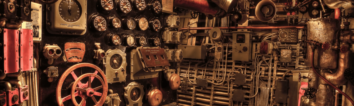 An engine room of a historical ship like ones at the Hellenic Maritime Museum.png