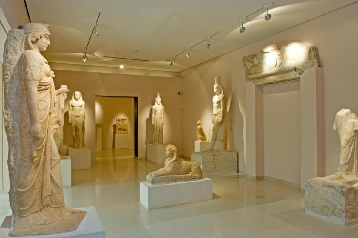 The interior of the Marathon Museum with marble statues and atiquties