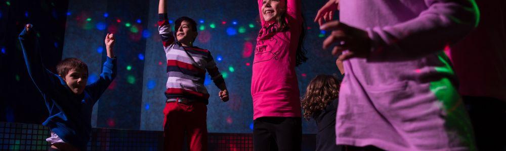 Kids between 7 and 11 years old are enjoying a disco dance birthday party in Joyride playground, in Agios Dimitrios, Athens, Greece