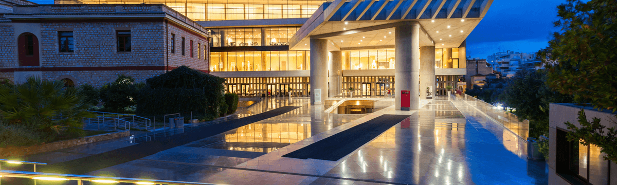 An outside view of the main entrance of the Acropolis Museum