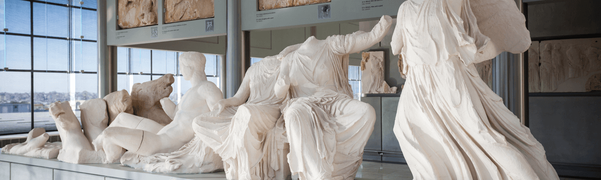 The series of statues from the frieze of the parthenon displayed at the Acropolis Museum of Athens