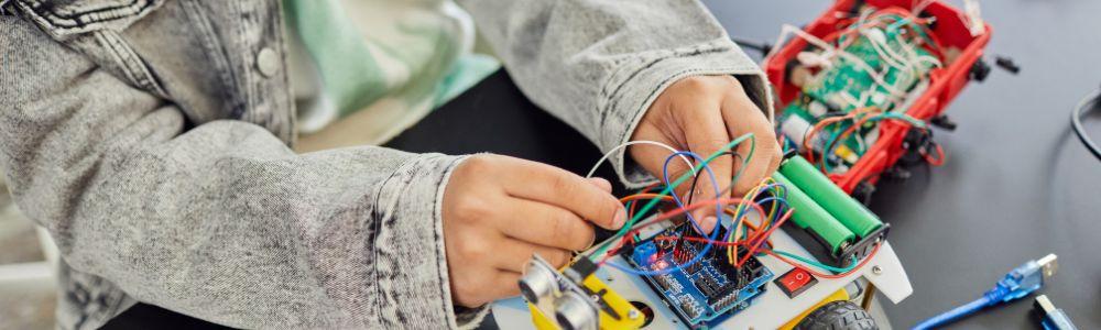 Child building a lego robot at Codora Spring Camps in Zurich