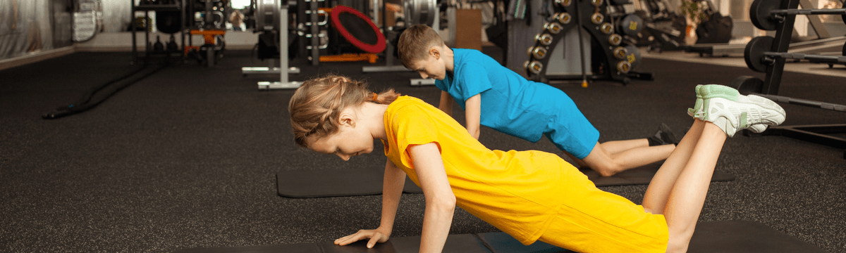 Two young pre-teens working out at CrossFit in Thalwil