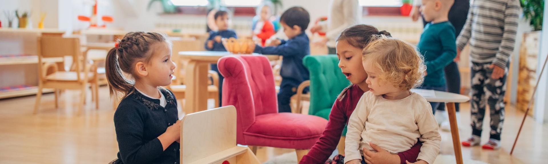 An indoor child-friendly space full of light where parents drop-off their children for an English playgroup near Zurich, Switzerland.  
