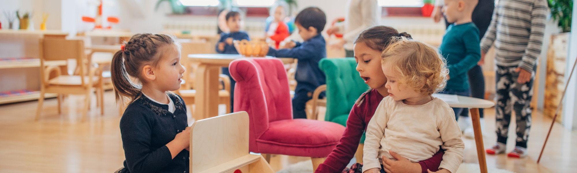 An indoor child-friendly space full of light where parents drop-off their children for an English playgroup near Zurich, Switzerland.  
