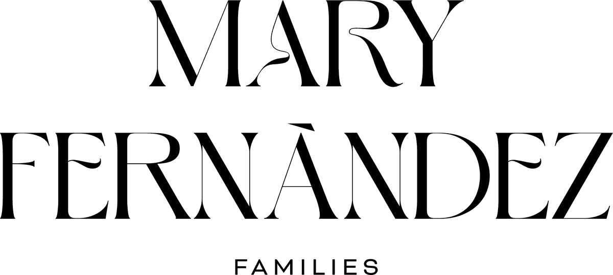 The black and white logo of Mary Fernandez , a family photographer based in Zug and Zurich.  