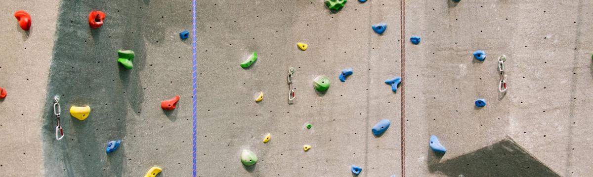 Interior of Pilatus Indoor Climbing Centre in Root, Switzerland, featuring expansive climbing walls, bouldering zones, and modern training facilities catering to climbers of all levels.