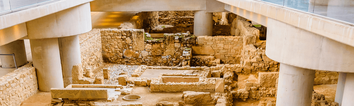 A view of ancient ruins displayed intact at the Acropolis Museum in Athens