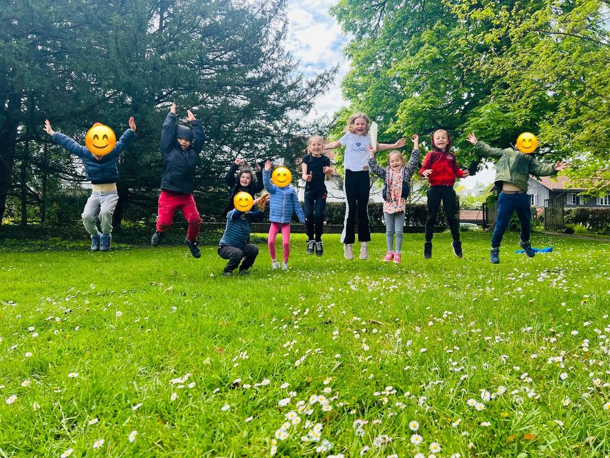 A group of kids enjoying the outdoors after a craft session during a weeklz camp at the Storycraft studio in Rüschlikon, Zurich.  