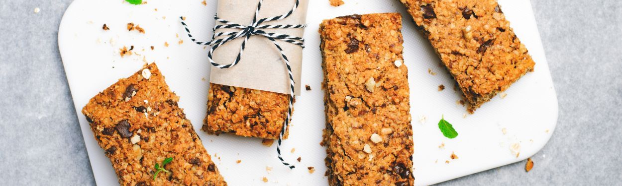 Cereal bars made at home ready for snacks with kids on-the-go and school lunches.  